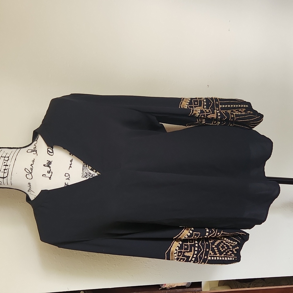 Chico's flowing embroidered blouse very flattering beautiful details
